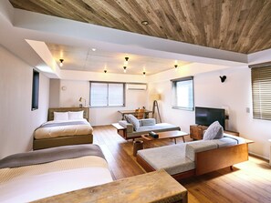 Habitación Deluxe con 2 camas individuales | Decoración individual, escritorio, espacio para trabajar con un portátil