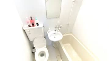 Apartment | Bathroom | Combined shower/tub, deep soaking tub, hair dryer, towels