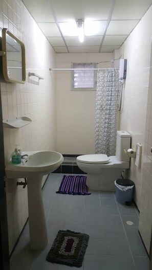 Shower, towels, soap, shampoo