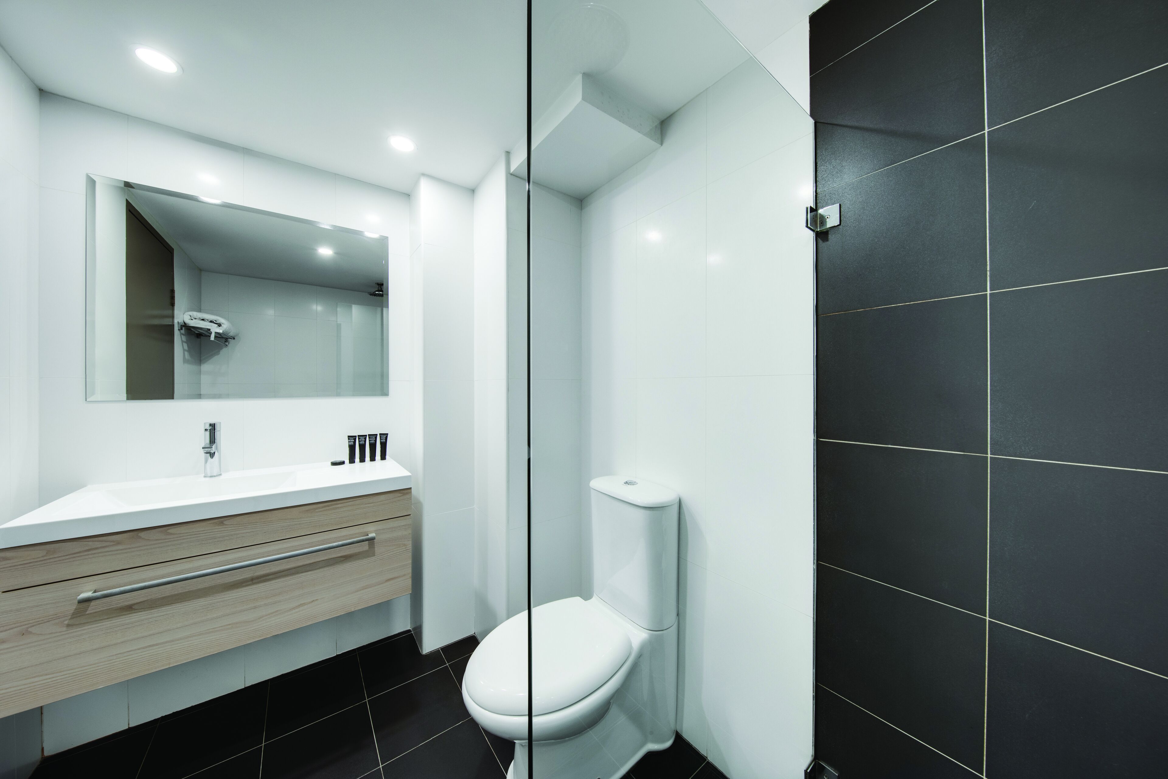 superior king balcony | bathroom | shower, rainfall showerhead, free toiletries, hair dryer