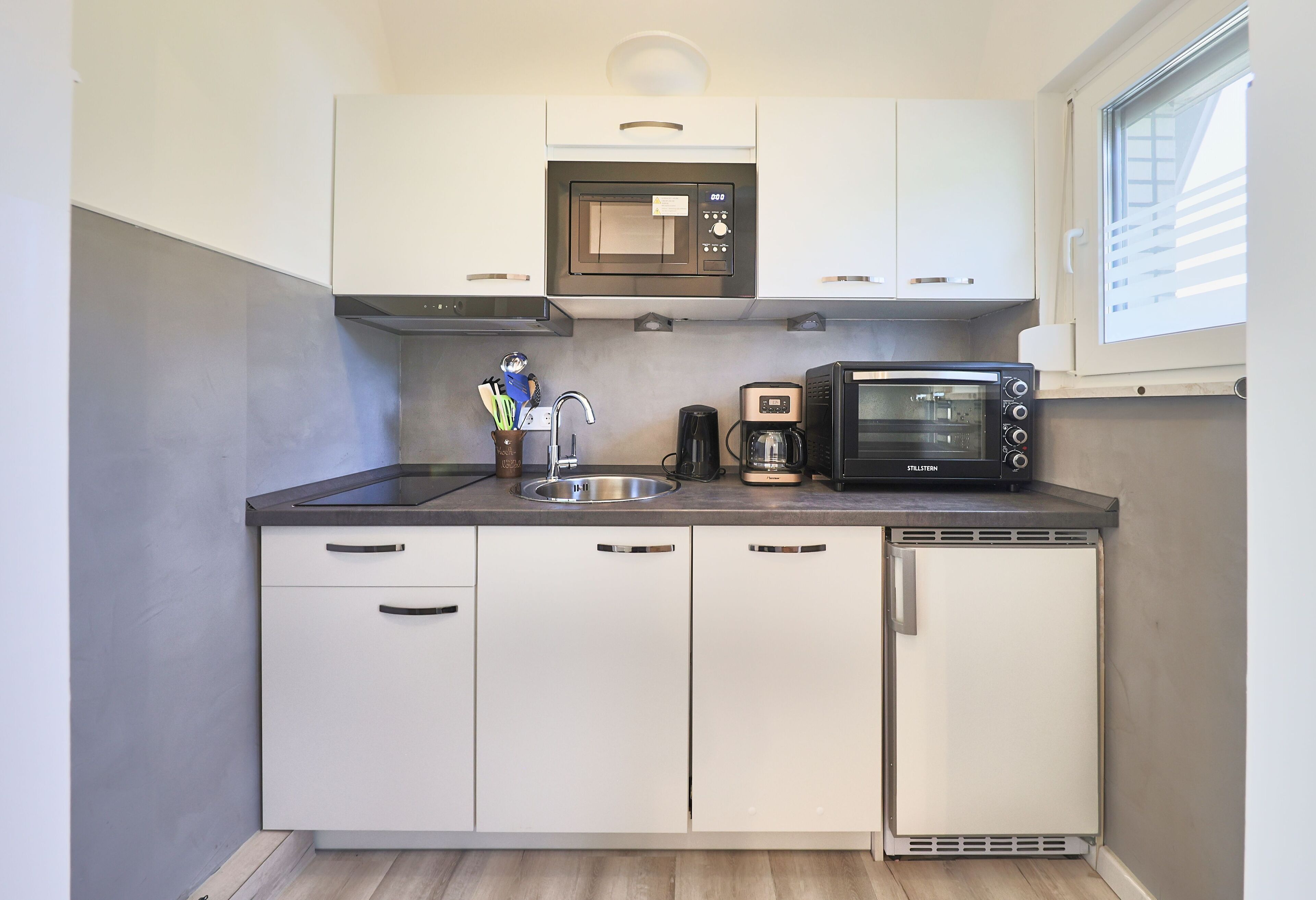 Fridge, microwave, dishwasher, coffee/tea maker