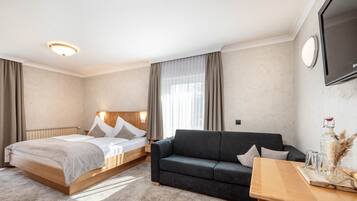 Klassieke vierpersoonskamer | Een kluis op de kamer, gratis wifi, beddengoed