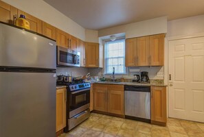 Fridge, microwave, oven, coffee/tea maker - 3BR Colonial House w/Parking by CozySuites (Alexandria)