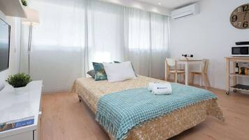 1 habitación, tabla de planchar con plancha, wifi y ropa de cama