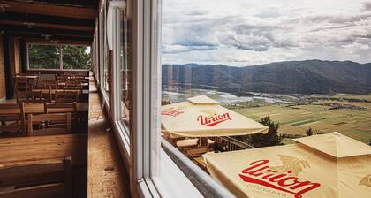 Lodge on Mount Slivnica with view on Cerknica intermittent lake.