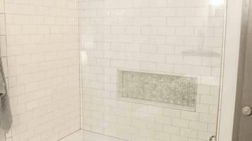 Bathtub, hair dryer, towels, soap