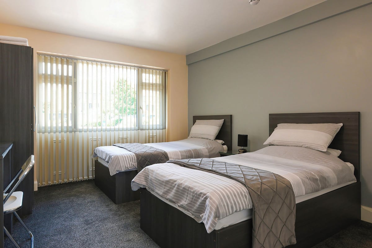Standard Twin Room, 2 Twin Beds, Shared Bathroom | Desk, free WiFi, bed sheets