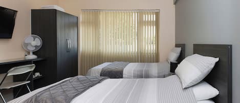 Standard Twin Room, 2 Twin Beds, Shared Bathroom | Desk, free WiFi, bed sheets