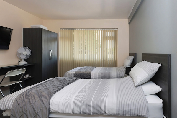 Standard Twin Room, 2 Single Beds, Shared Bathroom | Desk, free WiFi, bed sheets