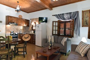 Traditionellt townhome | Vardagsrum | Platt-tv