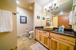 Hair dryer, towels, soap, shampoo