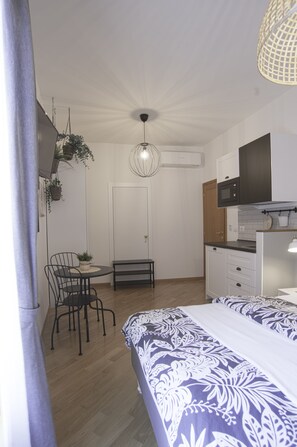 1 habitación, tabla de planchar con plancha, wifi y ropa de cama 