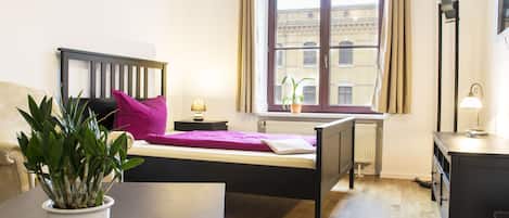 2 bedrooms, individually decorated, individually furnished, desk