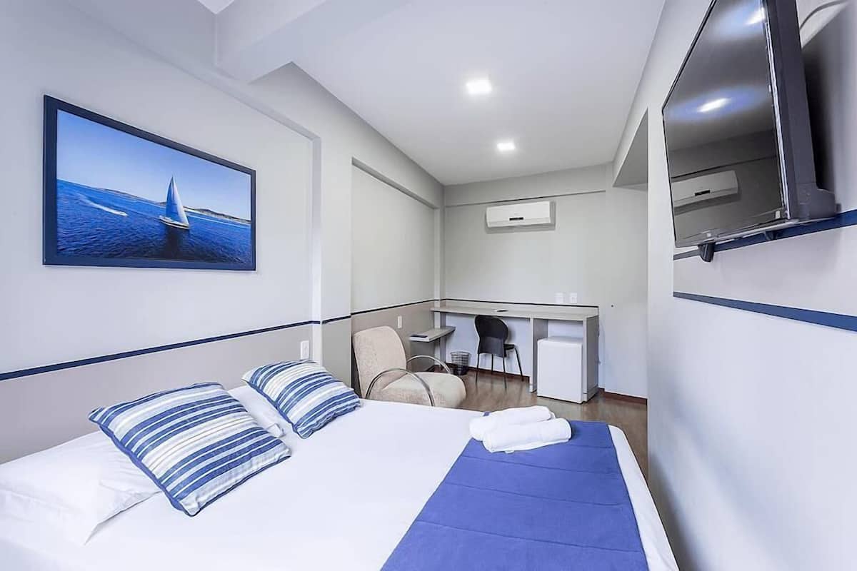 Desk, laptop workspace, free WiFi, bed sheets
