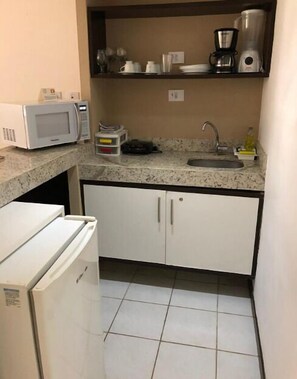 Fridge, microwave, coffee/tea maker, toaster