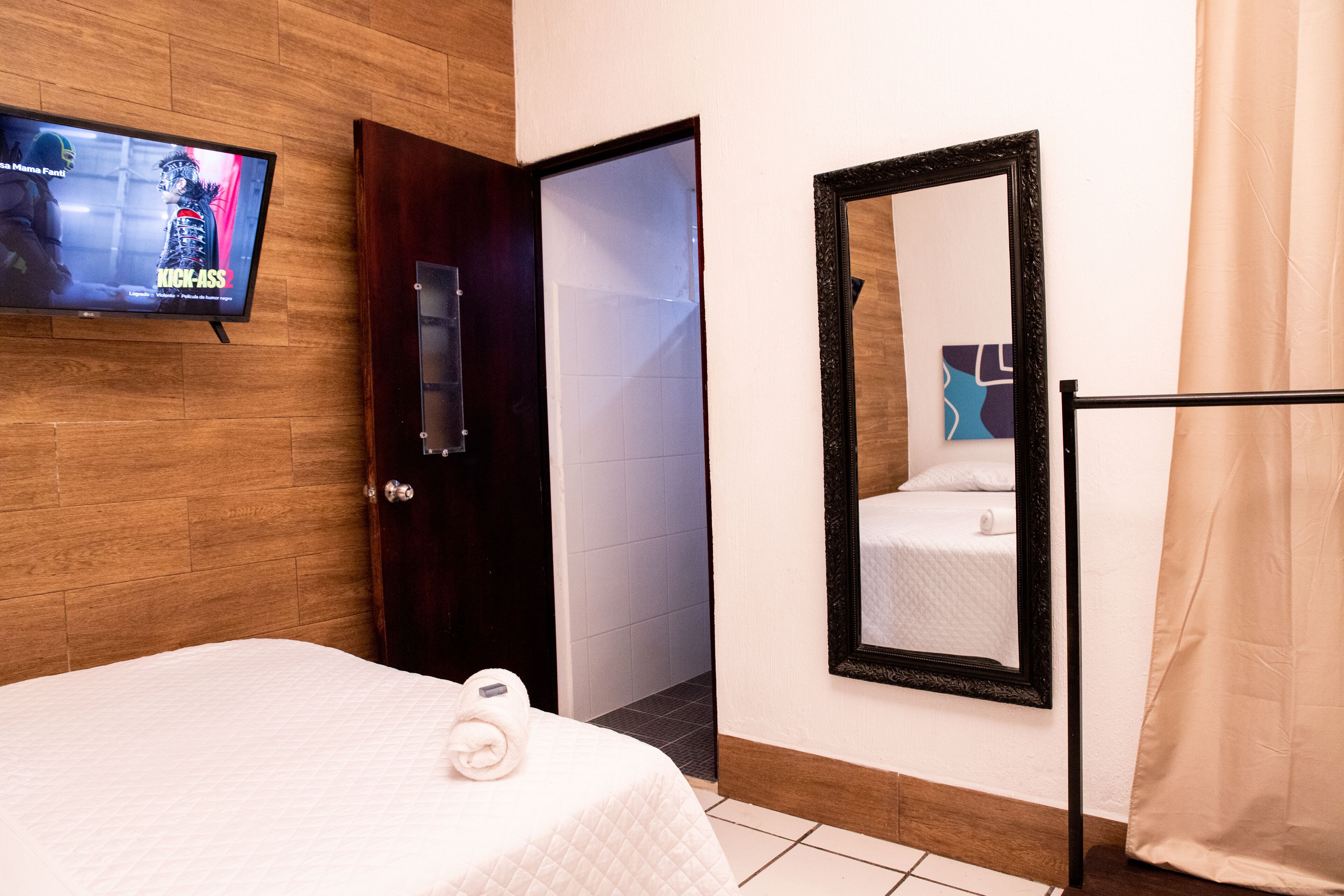 Mama Fanti Room | Premium bedding, down comforters, blackout drapes, soundproofing