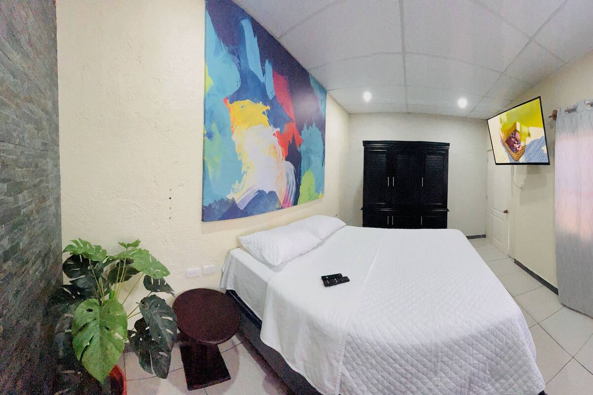 River Room | Premium bedding, down comforters, blackout drapes, soundproofing