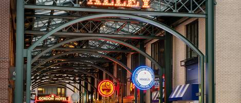 A covered public market entrance with a prominent '5th Street Market' sign.