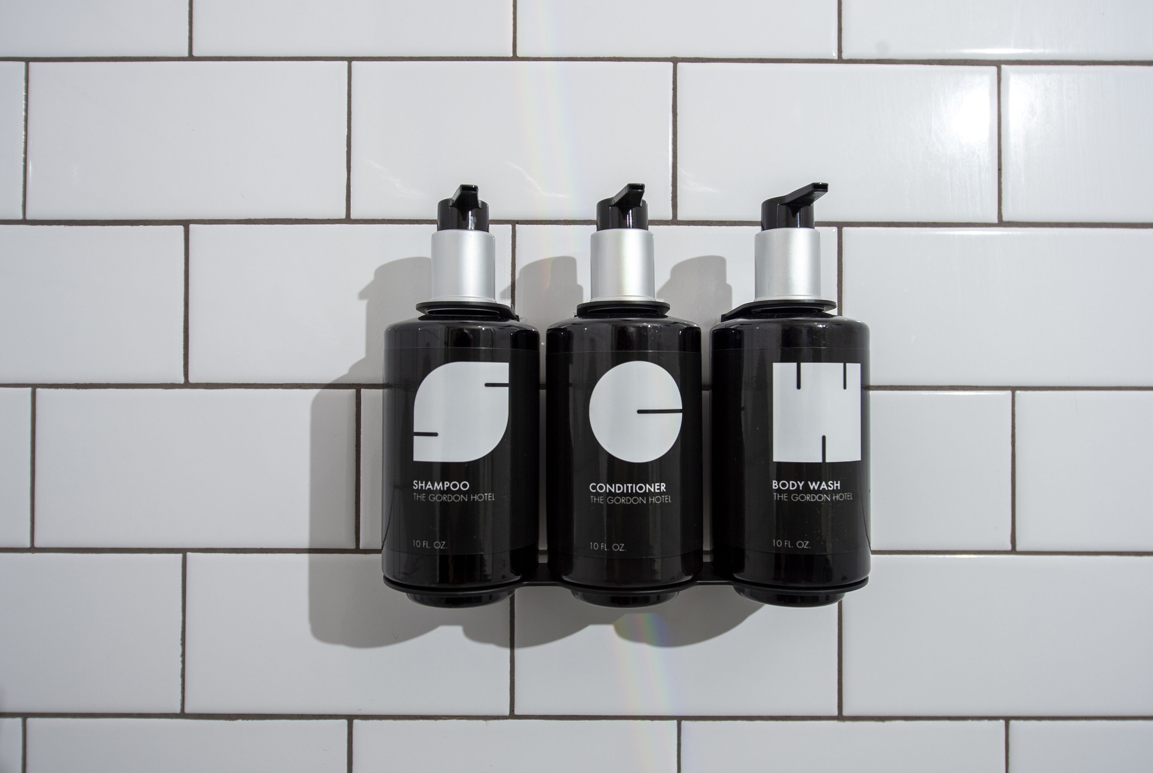 designer toiletries, bathrobes, towels