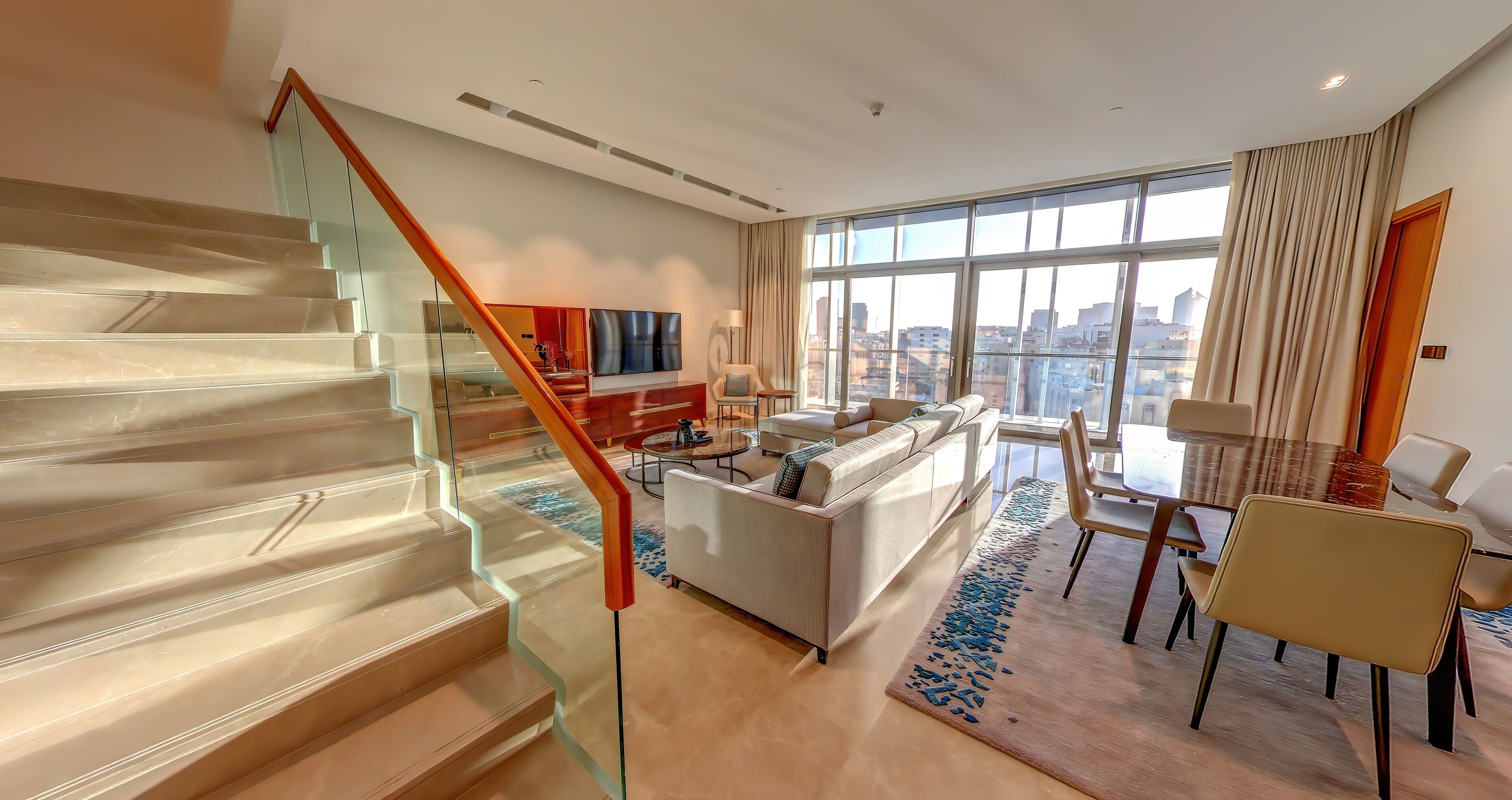 Three Bedroom Bliss Residence | Living area | Smart TV