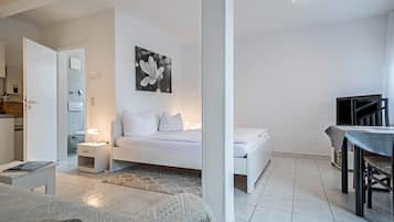 1 Schlafzimmer, BĂŒgeleisen/BĂŒgelbrett, kostenloses WLAN, BettwĂ€sche