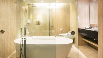 Junior Double Room, 1 King Bed | Bathroom | Shower, free toiletries, hair dryer, slippers