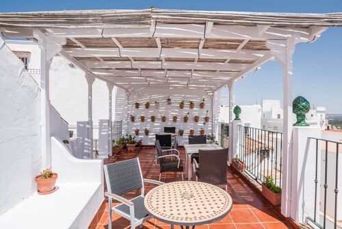 Appartement de vacances rustique "Casa La Costanilla F" avec terrasse sur le toit et vue panoramique