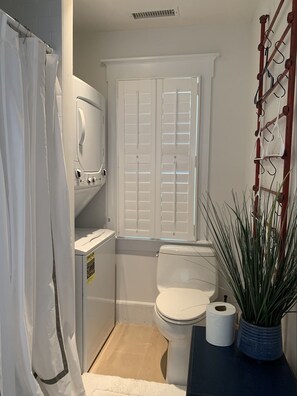 Shower, hair dryer, towels, soap