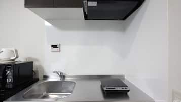 Fridge, microwave, stovetop, cookware/dishes/utensils