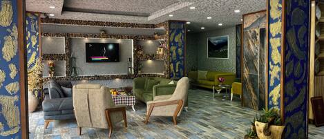 A modern living room with a stone wall, a flat-screen TV, and a green sofa.