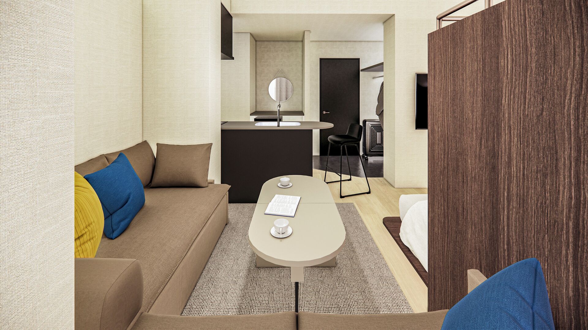Quarto de hotel moderno com sofá, mesa de centro pequena, cama, escrivaninha com espelho e televisão.