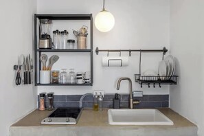 Fridge, microwave, stovetop, coffee/tea maker