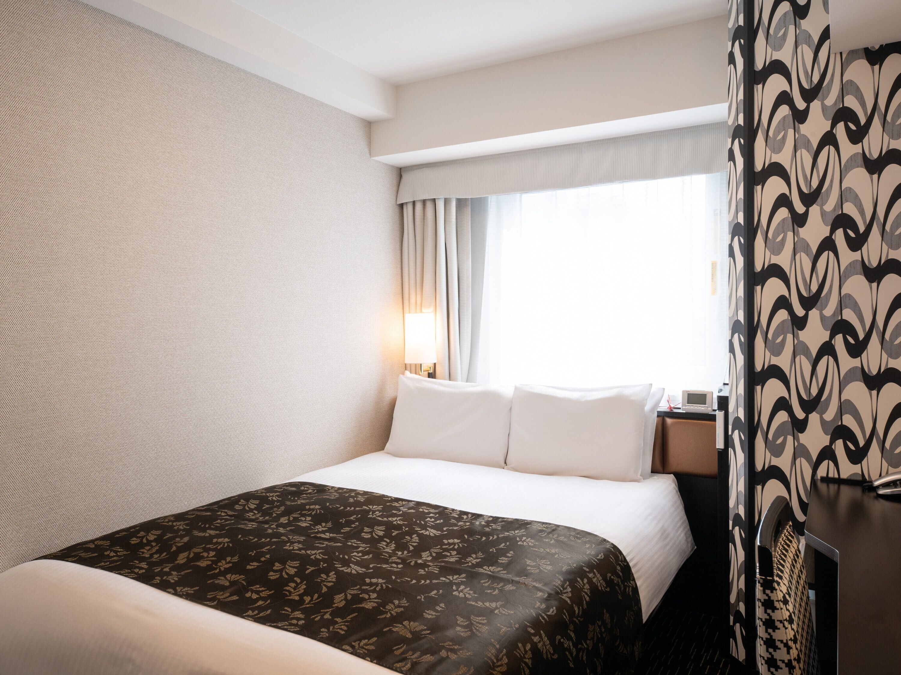 Premium bedding, down duvets, desk, laptop workspace