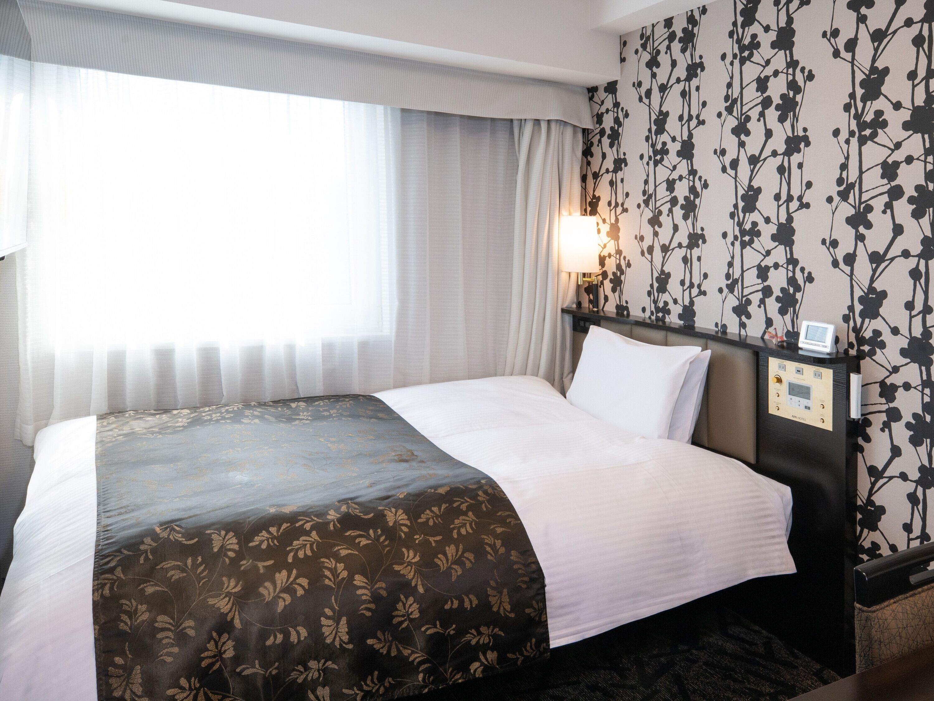 Premium bedding, down duvets, desk, laptop workspace