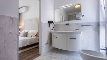Superior Apartment | Bathroom | Shower, rainfall showerhead, designer toiletries, hair dryer