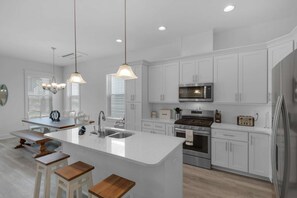 Fridge, microwave, dishwasher, coffee/tea maker