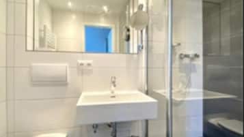 Shower, free toiletries, hair dryer, towels
