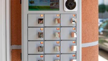 A ProControl Proxess Control panel with numbered slots, a digital display, and a camera.