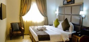 Habitación Prestigio | Caja de seguridad en la habitación, wifi gratis y ropa de cama