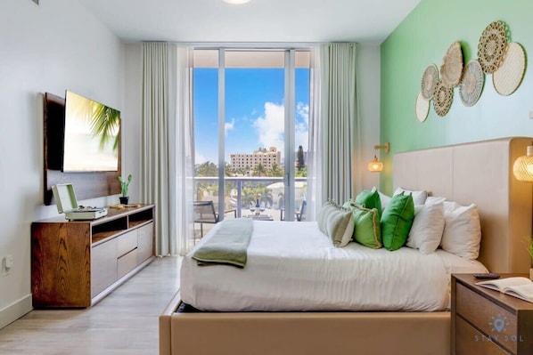 1 bedroom, desk, iron/ironing board, travel crib