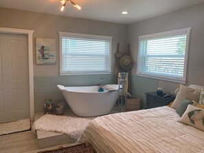 Bathtub, hair dryer, towels