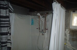 Shower, towels, soap, shampoo