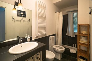 Shower, eco-friendly toiletries, hair dryer, bidet