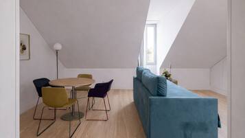 Apartment, 1 Bedroom | Living area | 32-inch flat-screen TV with cable channels