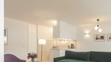 Apartment, 1 Bedroom | Living area | 32-inch LCD TV with cable channels, TV