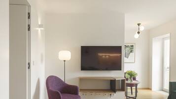 Apartment, 2 Bedrooms | Living area | 32-inch LCD TV with cable channels, TV