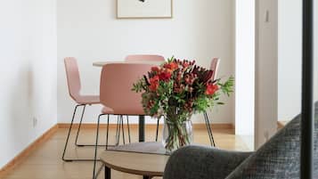 Deluxe Apartment, 1 Bedroom | Living area | 32-inch LCD TV with cable channels, TV