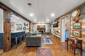 Smart TV, fireplace, DVD player, books