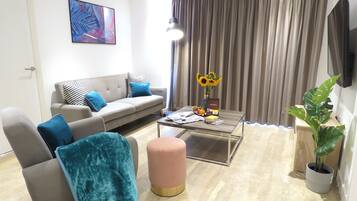 Apartment, 2 Bedrooms | Living area | LCD TV, Netflix, streaming services