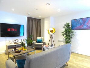 Departamento, 2 habitaciones | Área de sala de estar | Televisión LCD, Netflix y servicios de streaming